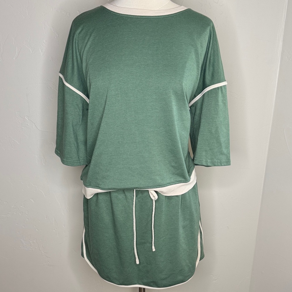 2 Piece Green and Cream Top & Skirt With Pockets Can fit smaller
